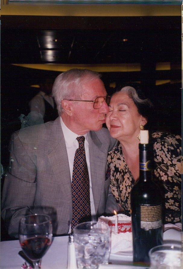 Elderly couple with wine glasses